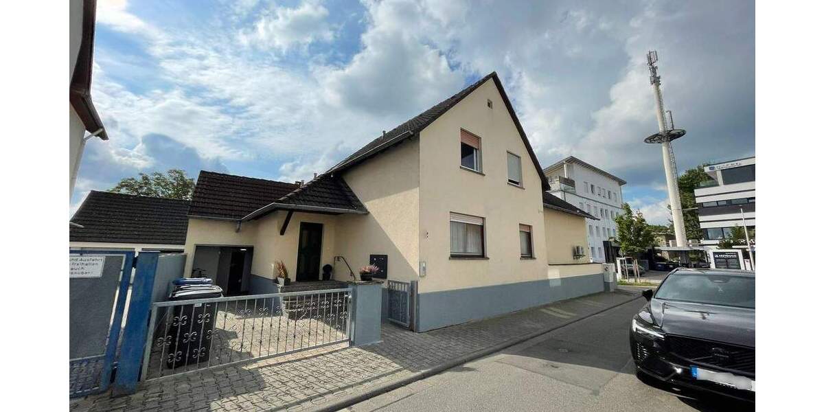 Wohn- und Geschäftshaus in Langen 9 zimmer