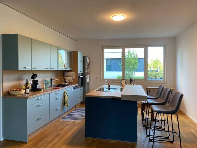 Traumhafte Erdgeschoss Terrassen Wohnung mit seitlichem Rheinblick