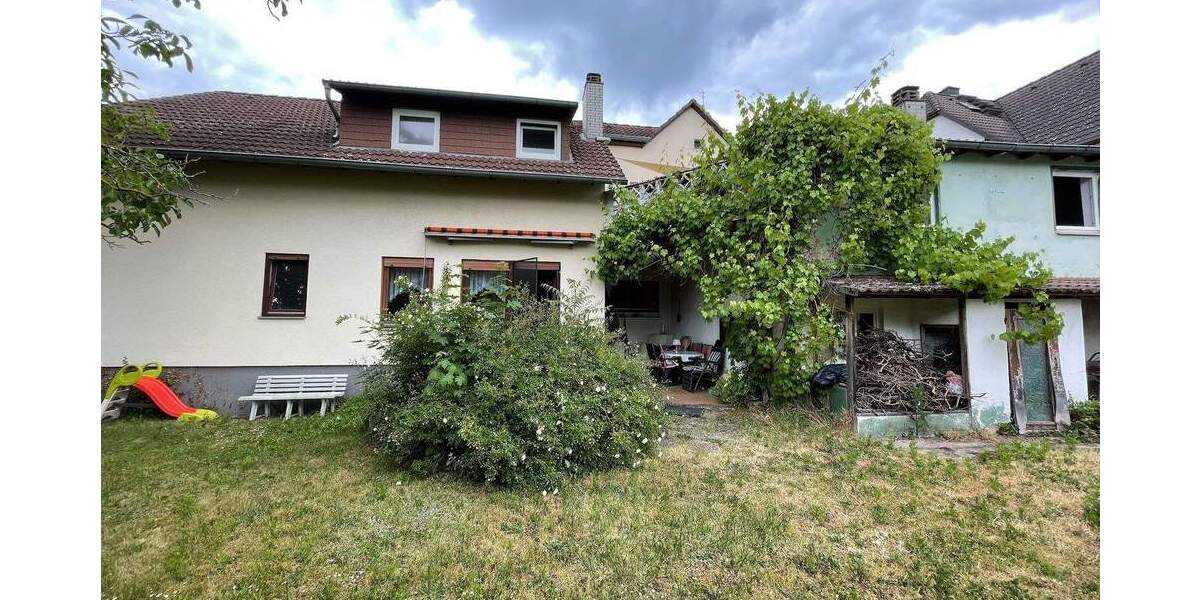 Wohn- und Geschäftshaus in Langen 9 zimmer