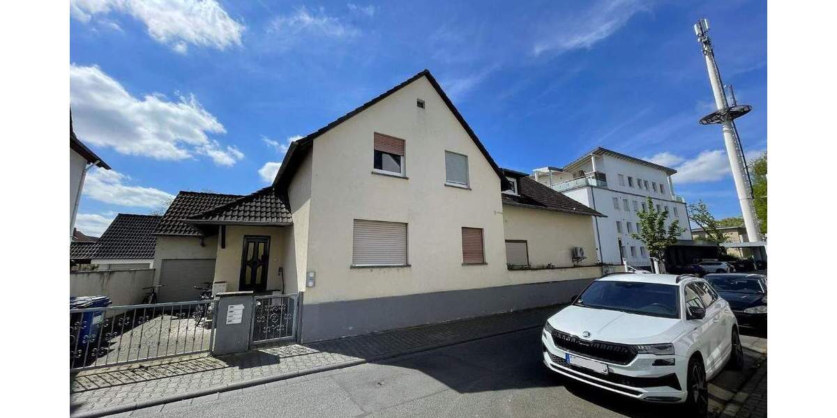 Wohn- und Geschäftshaus in Langen 9 zimmer