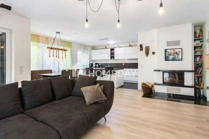 Neuwertige 4-Zimmer-Gartenwohnung mit Townhouse-Feeling, Kamin und verschließbarem TG-Stellplatz 4 zimmer