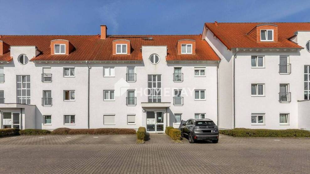 Charmante ZweiZimmer-Dachgeschoßwohnung mit Balkon und 2 Stellplätzen