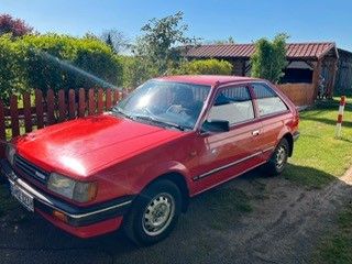 Mazda 323 97.500 km 3.299 &euro; Babenhausen 64832