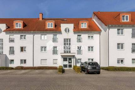Charmante ZweiZimmer-Dachgeschoßwohnung mit Balkon und 2 Stellplätzen