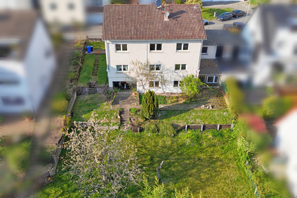 Mehrfamilienhaus mit Bauplatz in Ruppertshain - Haus Kelkheim | Angebot:23618439