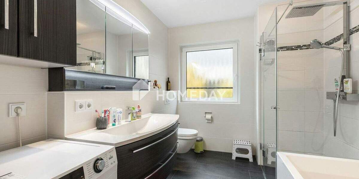 Neuwertige 4-Zimmer-Gartenwohnung mit Townhouse-Feeling, Kamin und verschließbarem TG-Stellplatz 4 zimmer