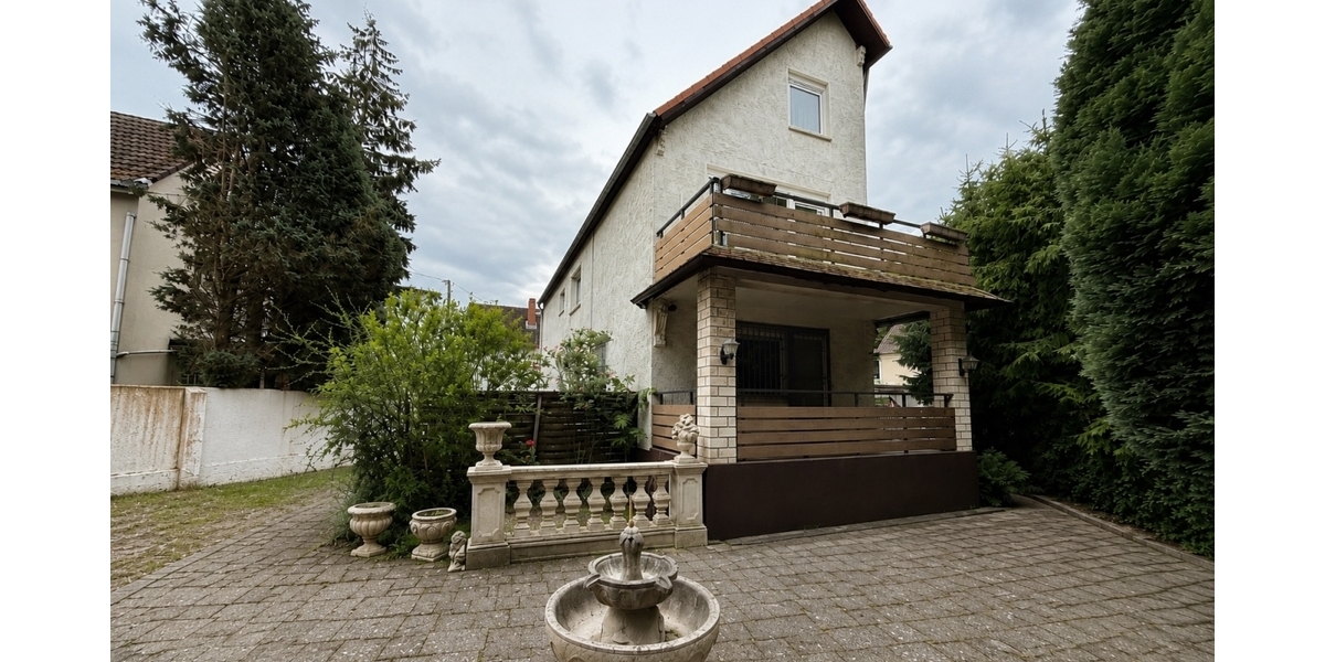 Vielseitiges Wohn- und Geschäftshaus mit großem Grundstück und Entwicklungspotenzial in Frankfurt-Bonames - Einfamilienhaus Frankfurt am Main Bonames | Angebot:26912907